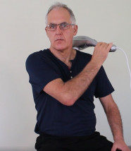Dr Graeme using General purpose Massager to treat trigger points
