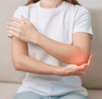 Woman with tennis elbow